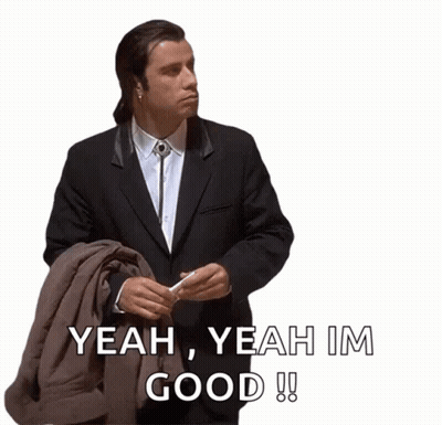 A Man In A Suit Is Holding A Jacket And Saying Yeah Yeah Im Good GIF