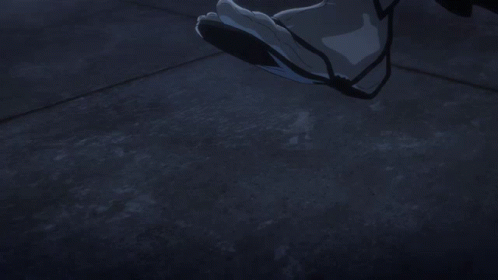 A Man In A Suit Is Holding A Sword GIF