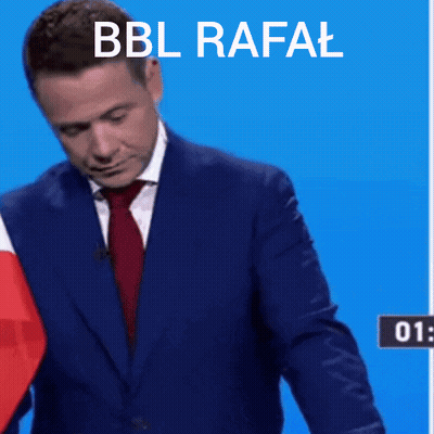 A Man In A Suit Is Kneeling At A Podium With The Words Bbl Rafal Written Above Him GIF