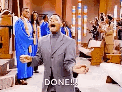A Man In A Suit Is Kneeling Down In A Church With His Arms Outstretched And Shouting . GIF