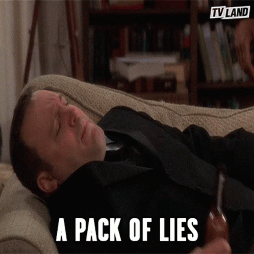 A Man In A Suit Is Laying On A Couch With The Words A Pack Of Lies Above Him GIF