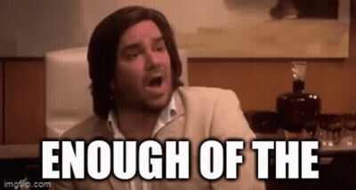 A Man In A Suit Is Making A Funny Face With The Words `` Enough Of The '' Written Above Him . GIF