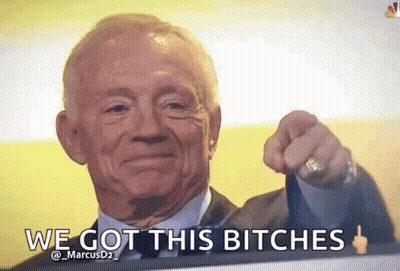 A Man In A Suit Is Pointing At The Camera With The Words We Got This Bitches Written Below Him GIF
