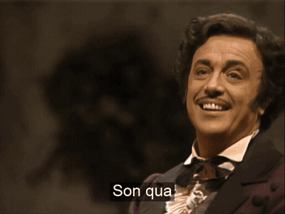 a man in a suit is singing with the words son qua written on the bottom