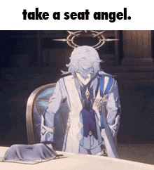 A Man In A Suit Is Sitting At A Table With The Words Take A Seat Angel On The Bottom . GIF