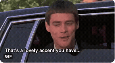 A Man In A Suit Is Sitting In A Car And Says That 'S A Lovely Accent You Have . GIF