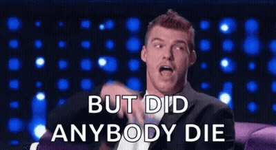 A Man In A Suit Is Sitting On A Couch And Saying `` But Did Anybody Die '' GIF