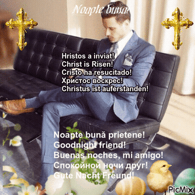 A Man In A Suit Is Sitting On A Couch With A Picture Of A Chick And A Cross Behind Him GIF