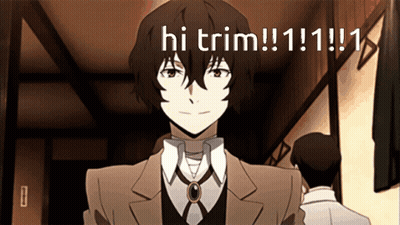 A Man In A Suit Is Smiling And Says Hi Trim GIF