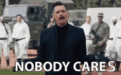 A Man In A Suit Is Standing In Front Of A Group Of Soldiers With The Words Nobody Cares Written Above Him . GIF