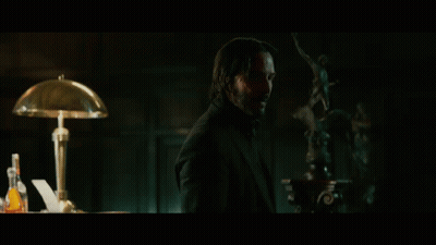 A Man In A Suit Is Standing In Front Of A Lamp With The Words " Not If I See " Written Above Him GIF