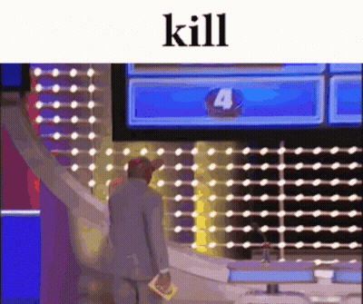 A Man In A Suit Is Standing In Front Of A Screen With The Number Four On It . GIF