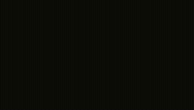 A Man In A Suit Is Standing In The Dark With His Eyes Closed GIF