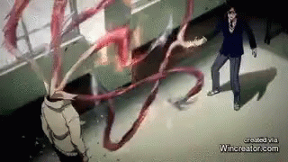 A Man In A Suit Is Standing Next To A Monster With Long Tentacles Coming Out Of It 'S Head . GIF