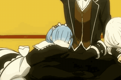 A Man In A Suit Is Standing Next To A Woman With Blue Hair GIF
