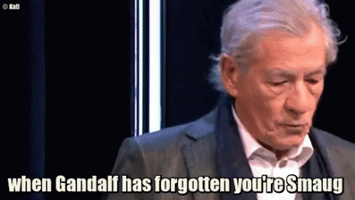 A Man In A Suit Is Talking About When Gandalf Has Forgotten You 'Re Smaug GIF