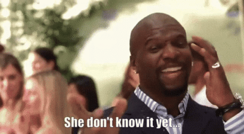 A Man In A Suit Is Talking On A Cell Phone And Says She Does N't Know It Yet . GIF