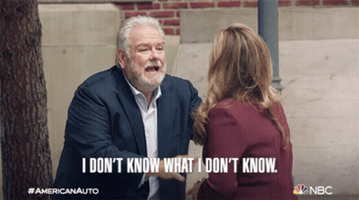 A Man In A Suit Is Talking To A Woman Who Says I Don T Know What I Don T Know GIF