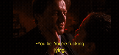 A Man In A Suit Is Talking To Another Man In A Dark Room With The Words - You Lie You 'Re Fucking Lying GIF