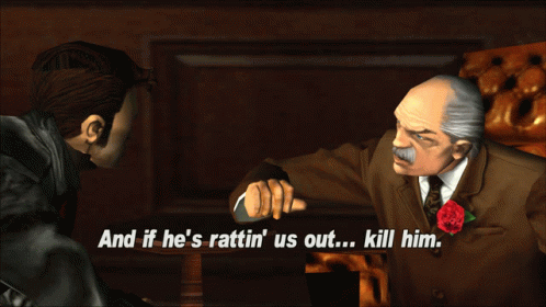 A Man In A Suit Is Talking To Another Man In A Video Game GIF