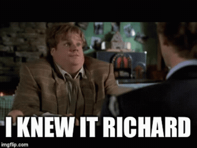 A Man In A Suit Is Talking To Another Man With The Caption I Knew It Richard .. GIF
