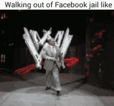 A Man In A Suit Is Walking Out Of A Facebook Jail GIF