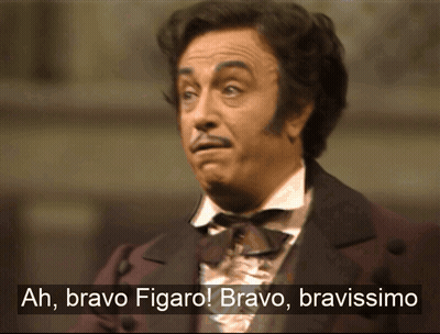 A Man In A Suit Says Ah Bravo Figaro Bravo Bravissimo GIF