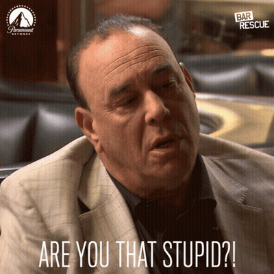A Man In A Suit Says " Are You That Stupid " In Front Of A Paramount Network Logo GIF