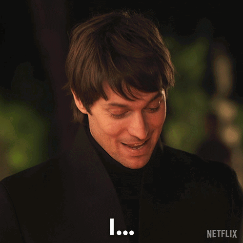 A Man In A Suit Says Completely Agree On A Netflix Poster GIF