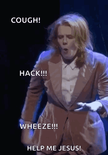 A Man In A Suit Says Cough Hack Wheeze And Help Me Jesus .. GIF