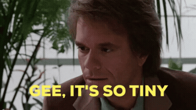 A Man In A Suit Says Gee It 'S So Tiny In Yellow GIF