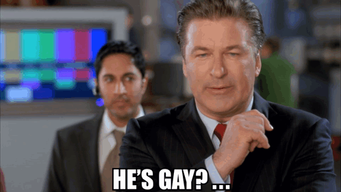 A Man In A Suit Says He 'S Gay In Front Of Another Man GIF