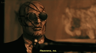A Man In A Suit Says Heavens No GIF