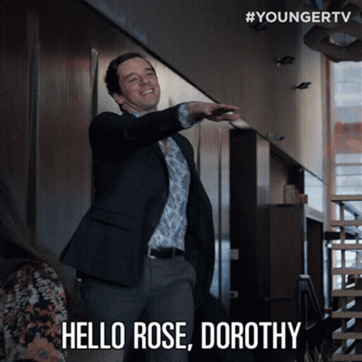 A Man In A Suit Says Hello Rose Dorothy In A Video GIF