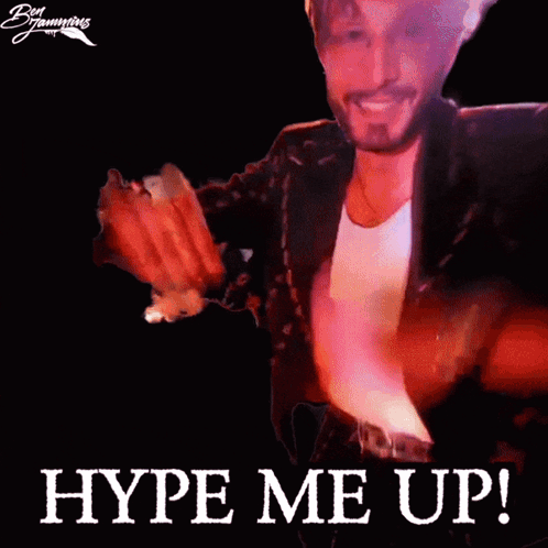 A Man In A Suit Says Hype Me Up In Front Of A Black Background GIF