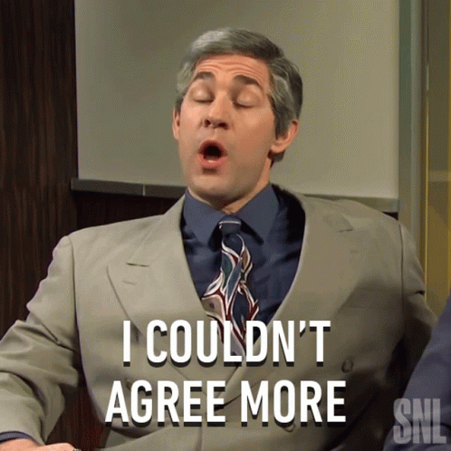 A Man In A Suit Says I Couldn 'T Agree More GIF
