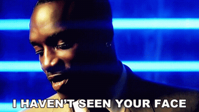 A Man In A Suit Says " I Haven T Seen Your Face " GIF
