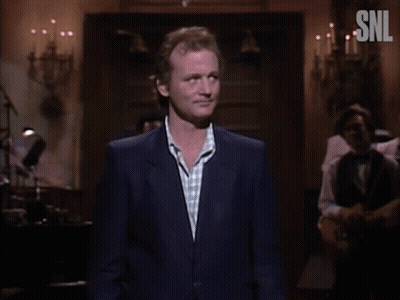 A Man In A Suit Says I 'M Frightened In Front Of A Crowd GIF