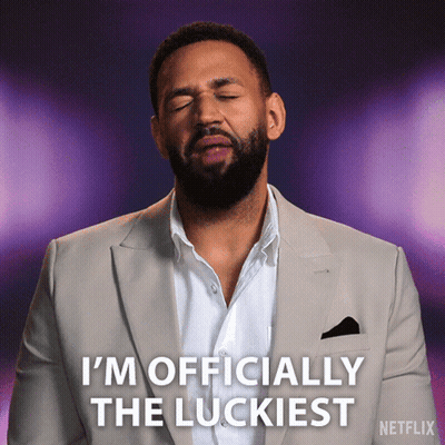 A Man In A Suit Says I 'M Officially The Luckiest Netflix GIF