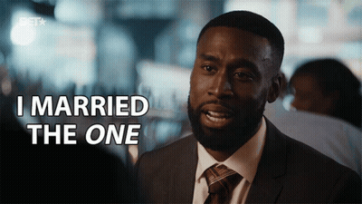 A Man In A Suit Says " I Married The One " GIF