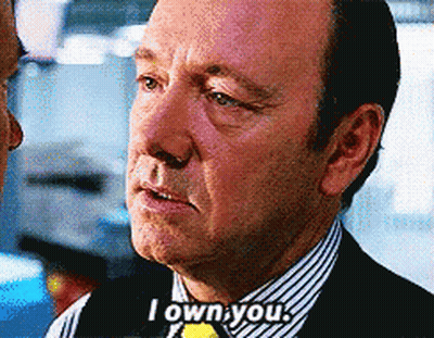 A Man In A Suit Says " I Own You " GIF