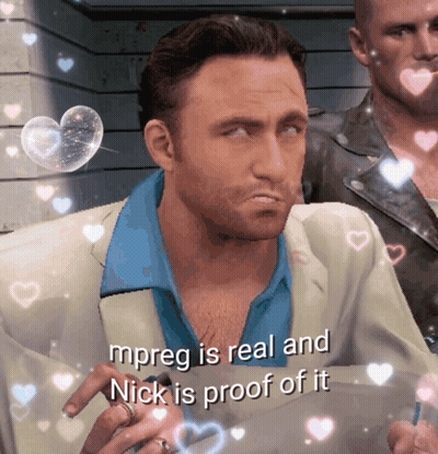 A Man In A Suit Says Mpreg Is Real And Nick Is Proof Of It With Hearts Around Him GIF