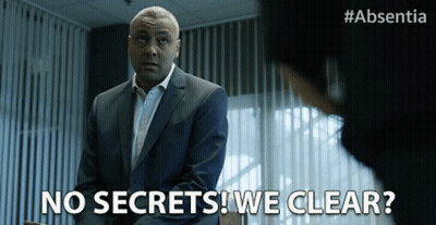 A Man In A Suit Says No Secrets We Clear In Front Of A Woman GIF