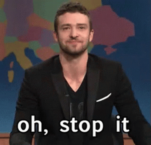A Man In A Suit Says Oh Stop It GIF