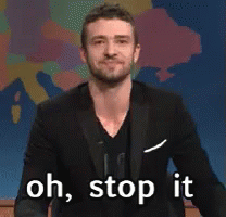 A Man In A Suit Says " Oh Stop It " GIF
