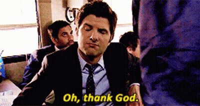 A Man In A Suit Says Oh Thank God GIF