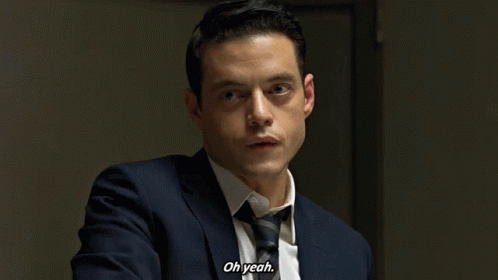 A Man In A Suit Says Oh Yeah GIF