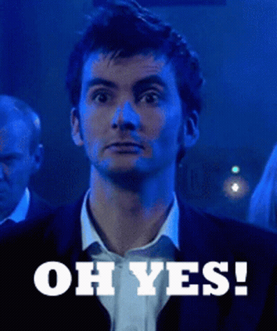 A Man In A Suit Says " Oh Yes " In Front Of Him GIF