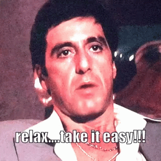 A Man In A Suit Says Relax Take It Easy !! GIF