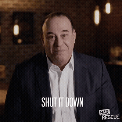 A Man In A Suit Says Shut It Down In Front Of A Bar Rescue Logo GIF